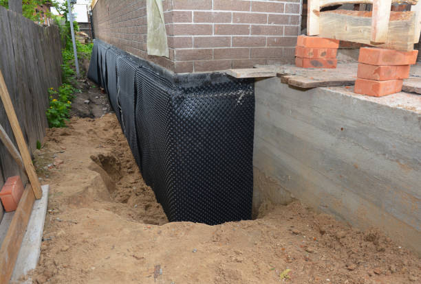 SJ Waterproofing Pros technician performing targeted Exterior Waterproofing assessment in Lignum, VA